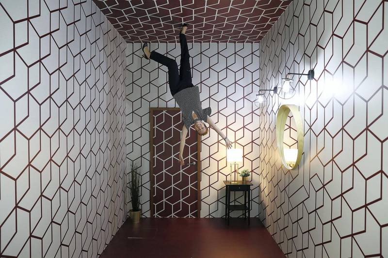 Defy Gravity at the Upside Down Room